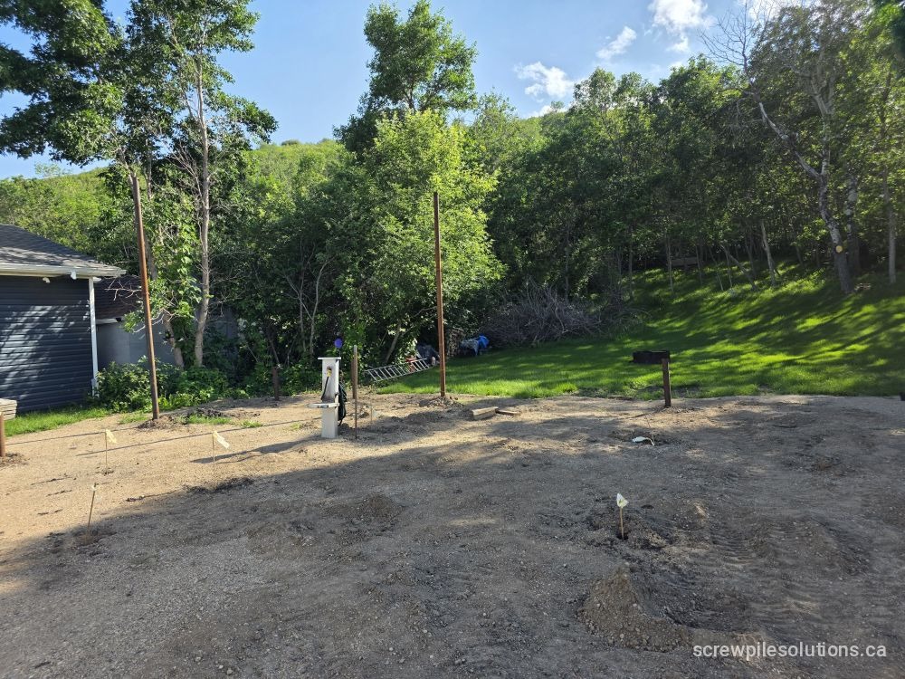 Partially installed substandard piles on job site